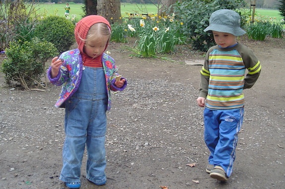 Two children outside playing with their GeoVisions au pair in Ireland.