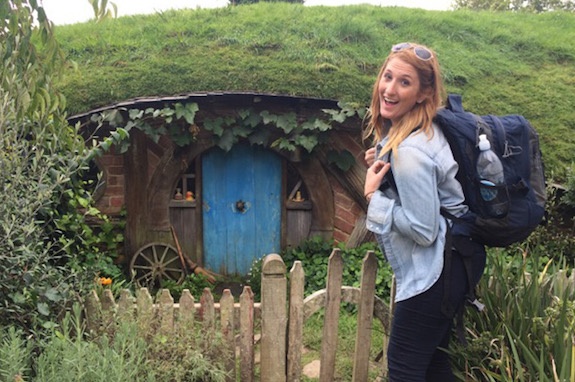 A GeoVisions au pair visiting Hobbiton in New Zealand, taking a break from her host family.